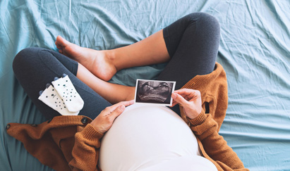 Pregnant Belly with ultrasound photo